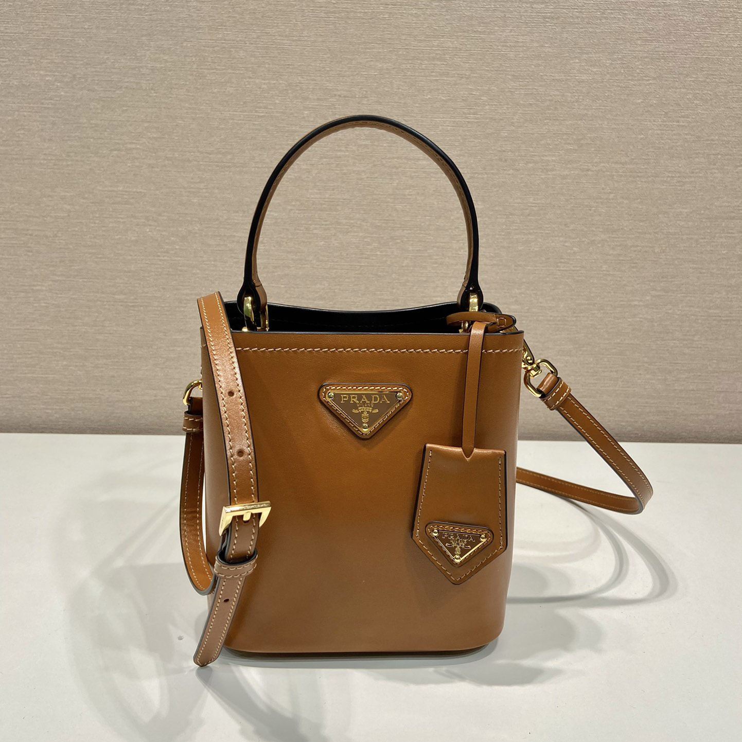 Pra*a top handle bags